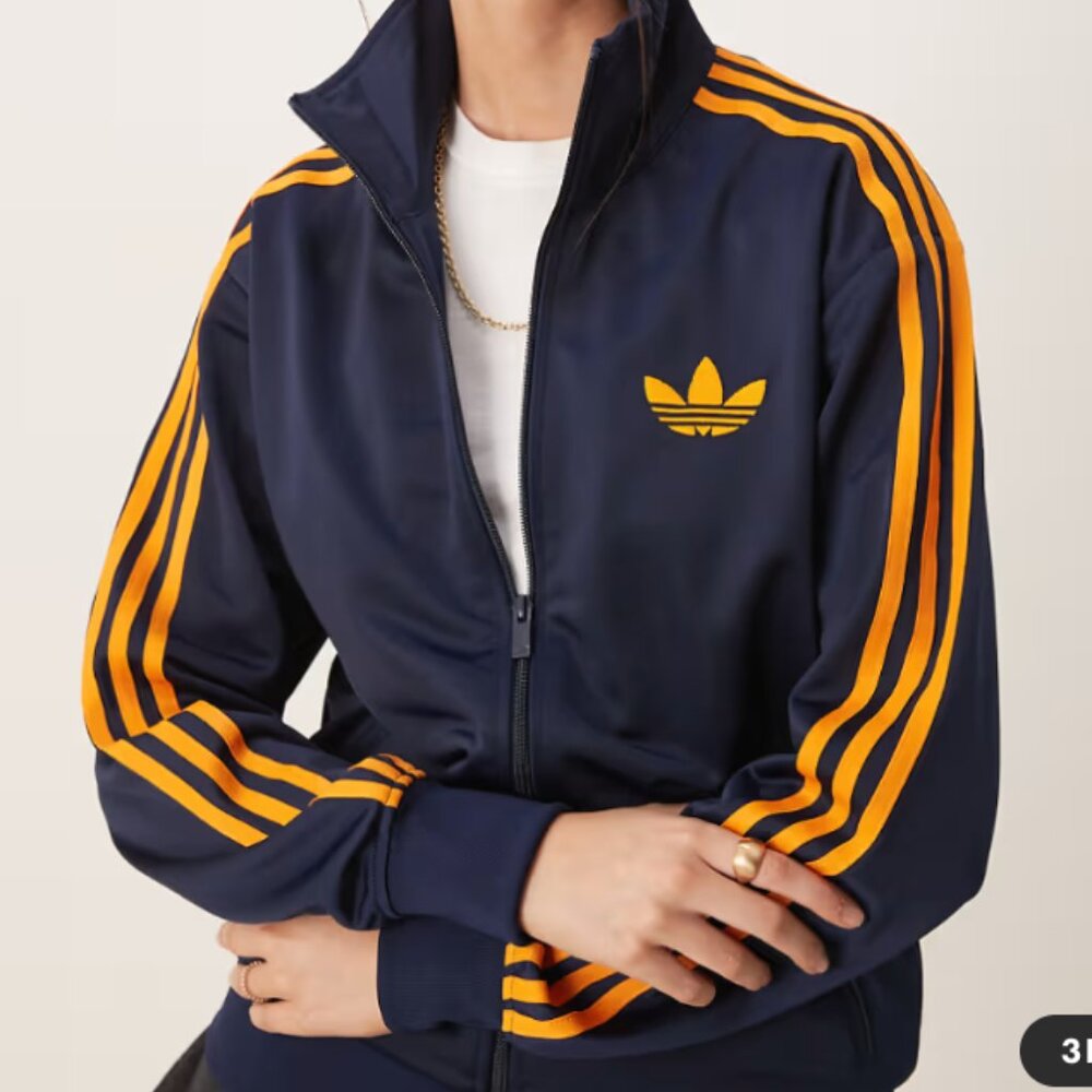 ADIDAS Originals Firebird track suit in navy and orange